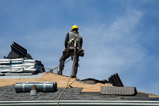 Professional Roofing technician working in Wilsonville, OR